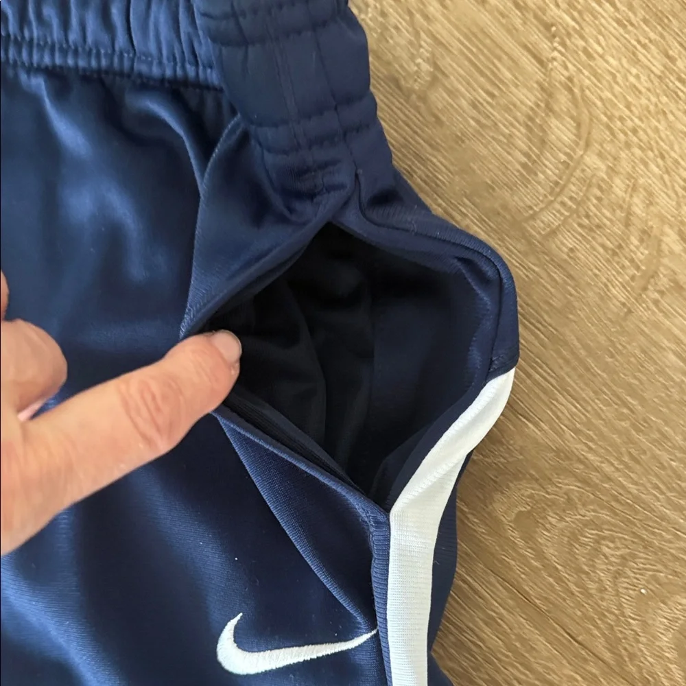 Nike Kids Navy Track Pants with White Side Stripes, Size Medium